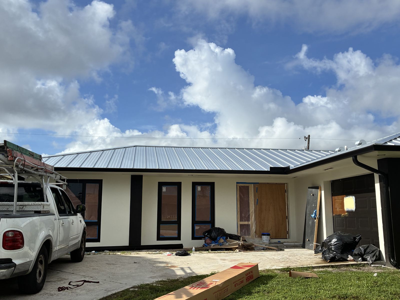 Seamless gutter on a metal-roof home in South Florida