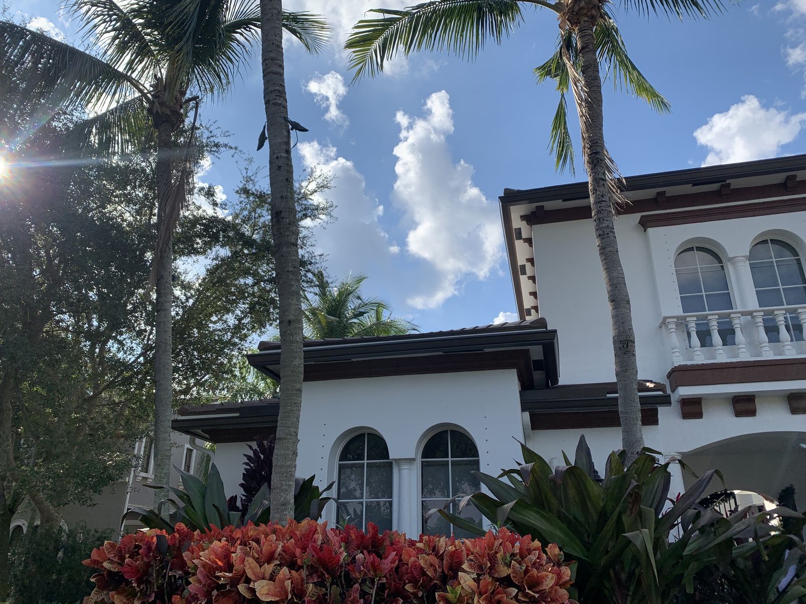 Seamless aluminum gutter along the fascia of a Mediterranean-style South Florida home