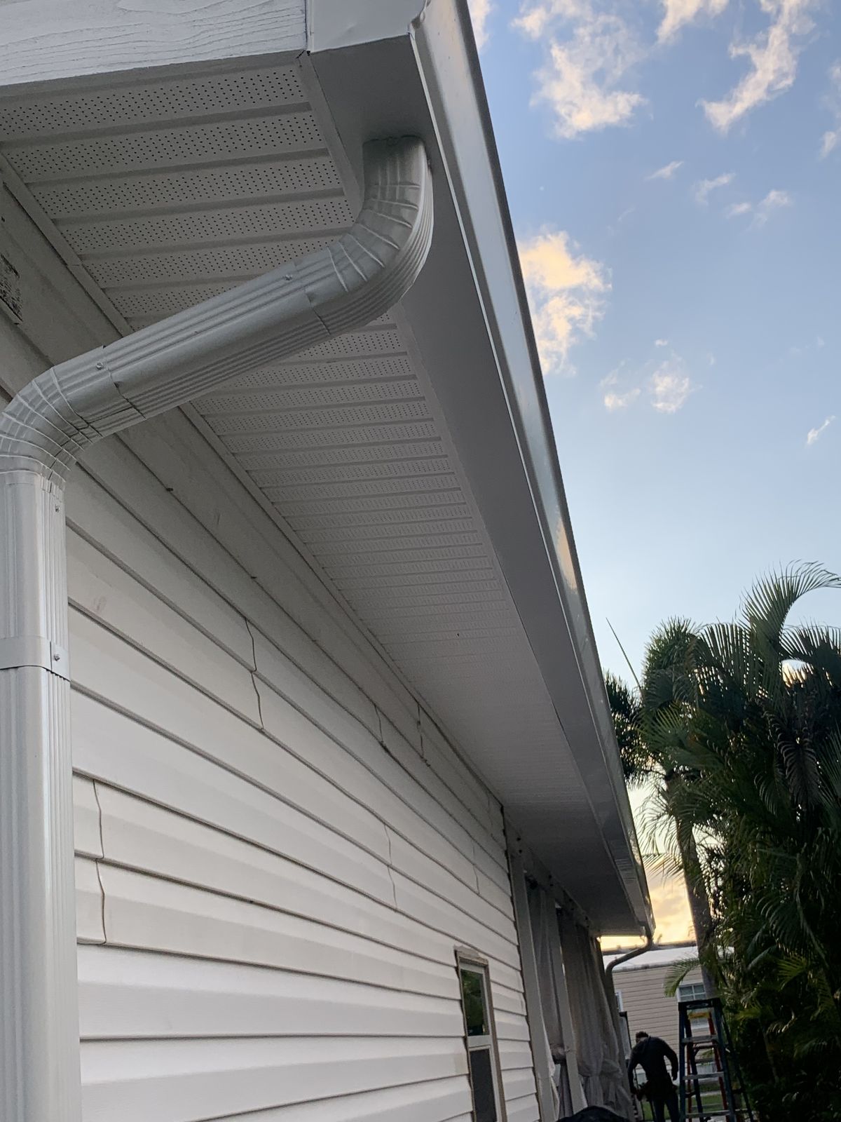 Seamless gutter, downspout, and soffit detail on a South Florida home