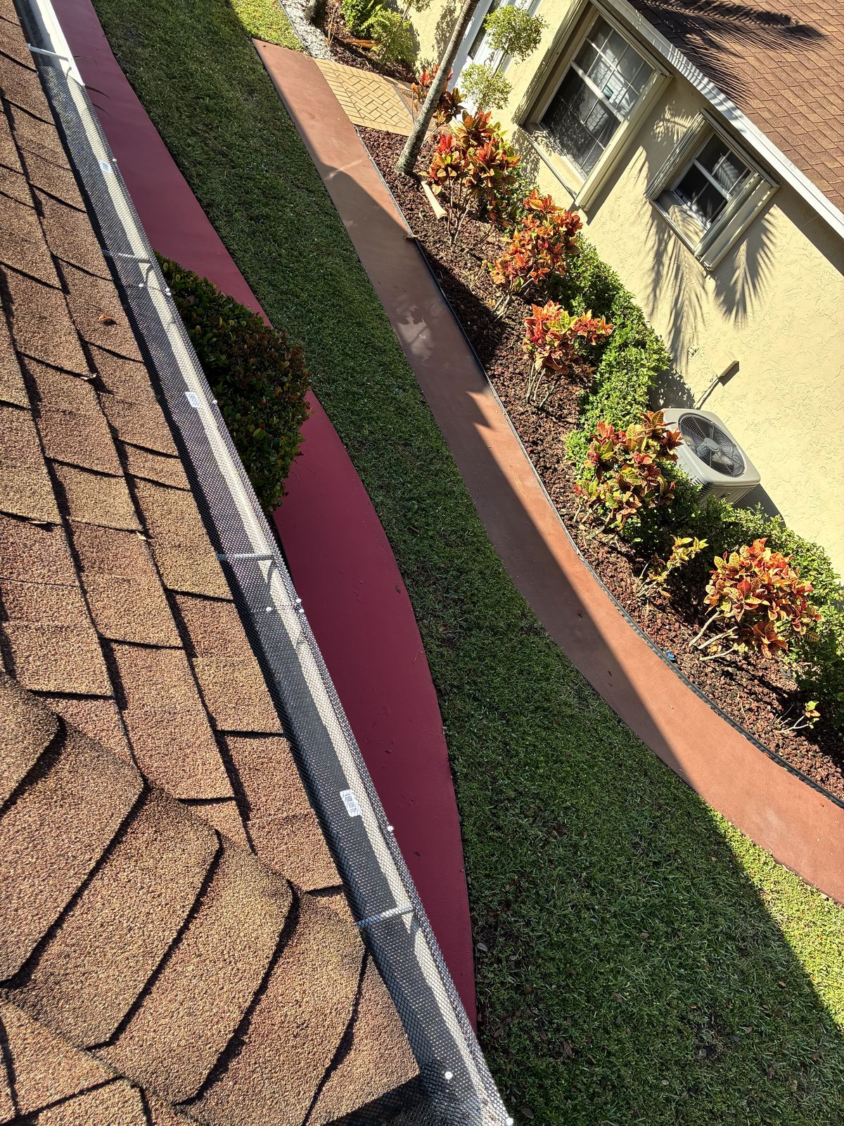 Leaf guard / gutter screen keeping debris out of the gutter