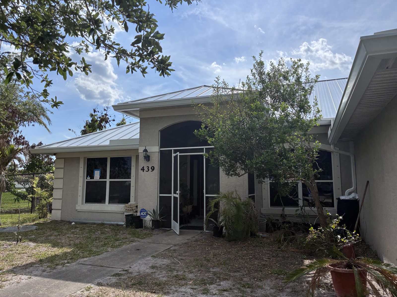 Screened entry enclosure on a South Florida home
